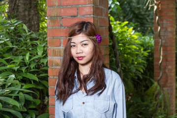 Filipina woman in a garden