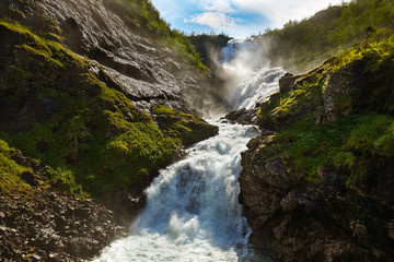 Naklejka na ściany i meble Giant Kjosfossen waterfall in Flam - Norway