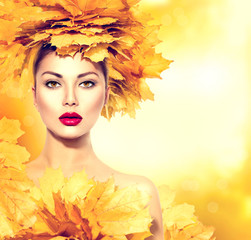 Autumn woman with yellow leaves hair style