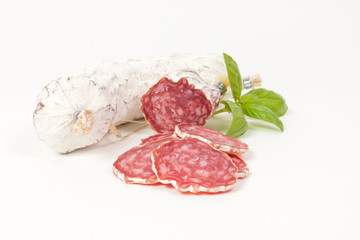 Salami sliced on the white background