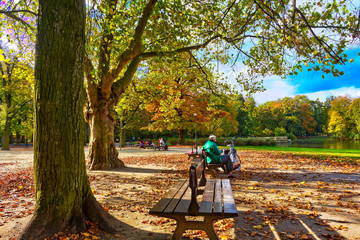Fototapeta premium People sitting in park