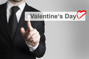 businessman pushing flat button valentines day