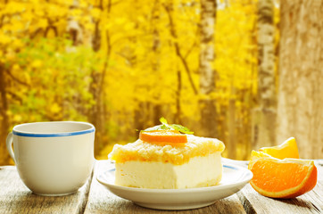 cake with orange, cream cheese and crumbs