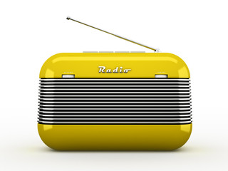 Old yellow vintage retro style radio receiver isolated on white
