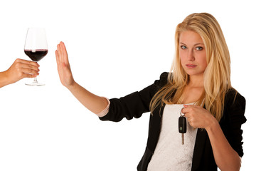 beautiful blond woman gesturing don't drink and drive gesture, w
