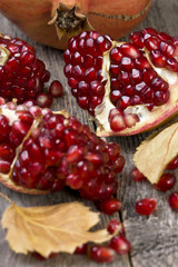 fresh pomegranate on wooden background