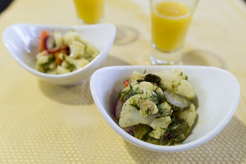 Vegetable salad with cauliflower in portioned plates