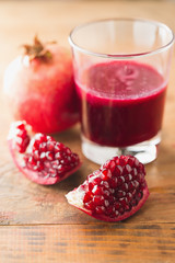 Pomegranate and glass of pomegranate juice