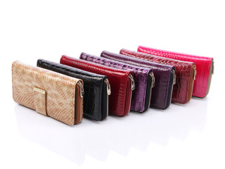 Women's leather wallets on a white background