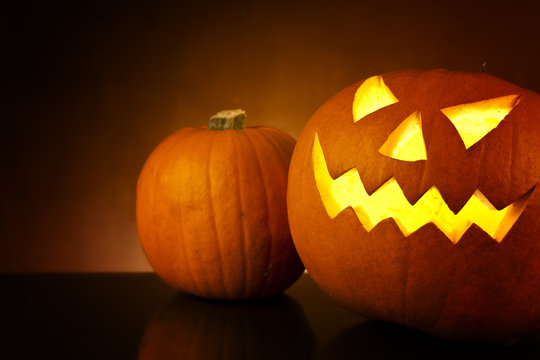Halloween pumpkin head jack lantern with scary evil faces spook