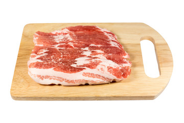 pork belly slice on a wooden board