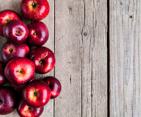 ripe apples on wooden table