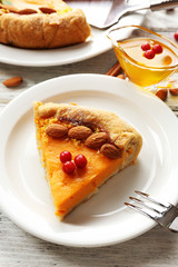 Homemade pumpkin pie on table