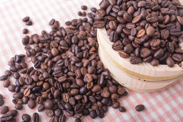 Studio Shot of Coffee Beans in a wooden bucket
