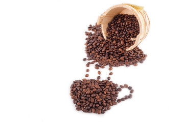 Coffee beans arranged in a coffee mug shape