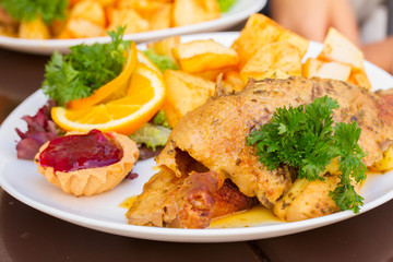 polish traditional dish  - duck with apples and potato