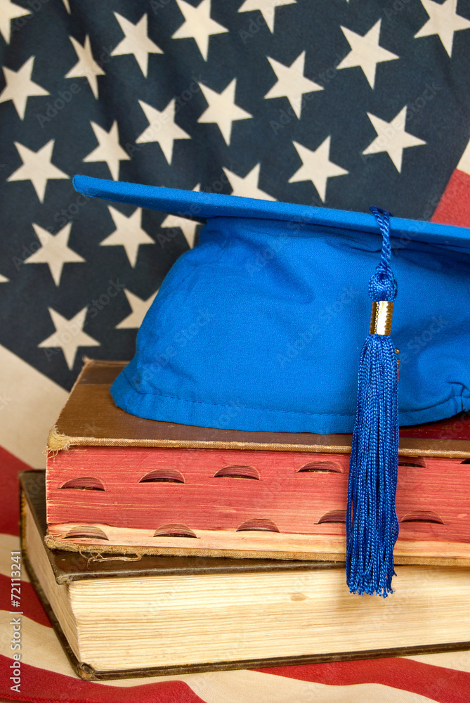 Poster blue graduation cap on books with flag - Posters