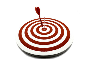 Fototapeta na wymiar Red dart target with red arrow