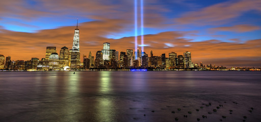 New York City skyline with 9-11 tribute light - obrazy, fototapety, plakaty