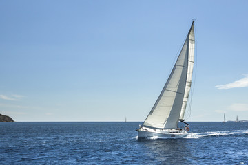 Obraz premium Boat in sailing regatta. luxury cruise yachts.