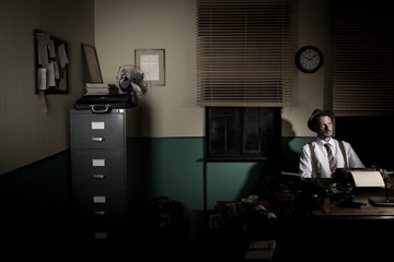 Reporter working late at night