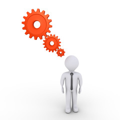 Businessman is thinking with cogwheels