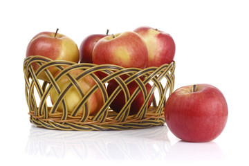 Apples in a basket isolated