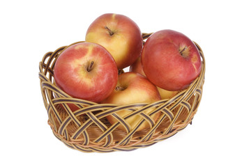 Apples in a basket isolated