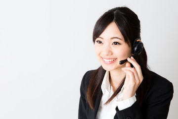 asian businesswoman using headset