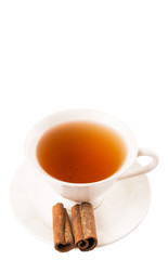 A cup of tea and cinnamon stick