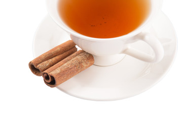 A cup of tea and cinnamon stick