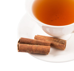 A cup of tea and cinnamon stick