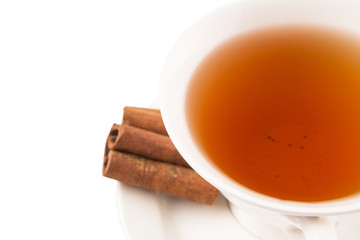A cup of tea and cinnamon stick
