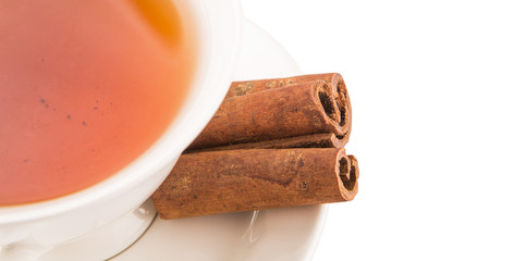 A cup of tea and cinnamon stick