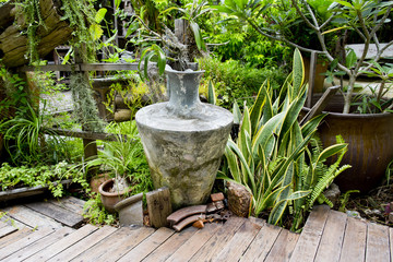 antique style garden vase in garden