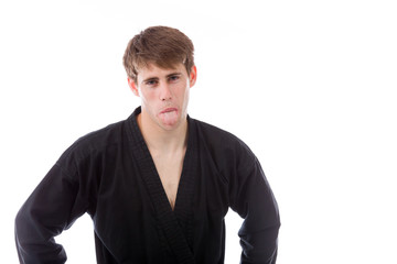 model isolated on plain background face sticking tongue out