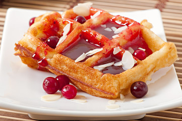 Waffles with cranberry syrup