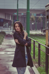Fototapeta premium Pretty girl posing in the city streets