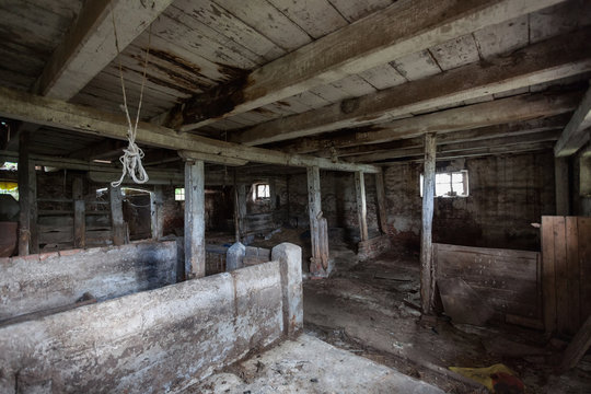 Interior of an old, decaying barn