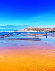 Orange und blauer Strand bei Ebbe © ines39