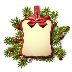 Paper gift card over spruce twigs.