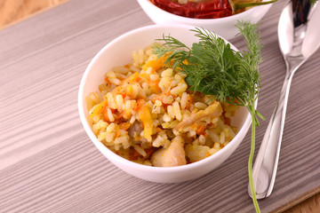 Chinese rice in a bowl on a wooden table