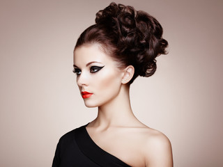 Portrait of beautiful sensual woman with elegant hairstyle