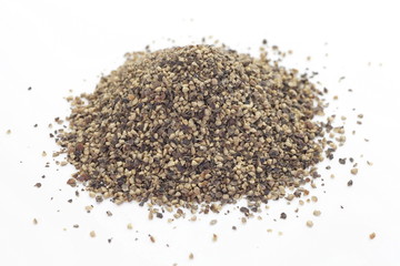 Close - up Black pepper powder in wooden spoon