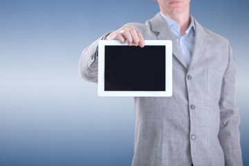 Businessman holding digital tablet