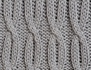 Grey knitted fabric background