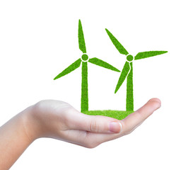Green wind turbines symbol in hand