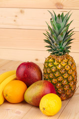 Fruit variety on wood.