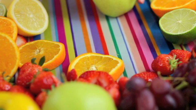 Close up Chopping fruit in colorful kitchen scene