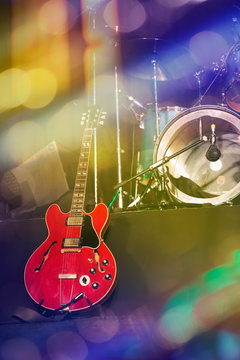 Guitar and drums on stage